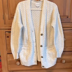 Medium white cardigan with buttons going down, comfortable